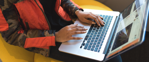 Photo of woman working on laptop