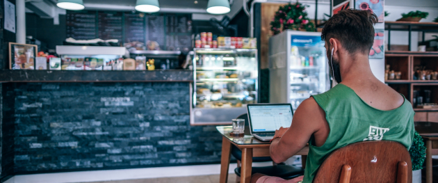 Photo of man working on laptop